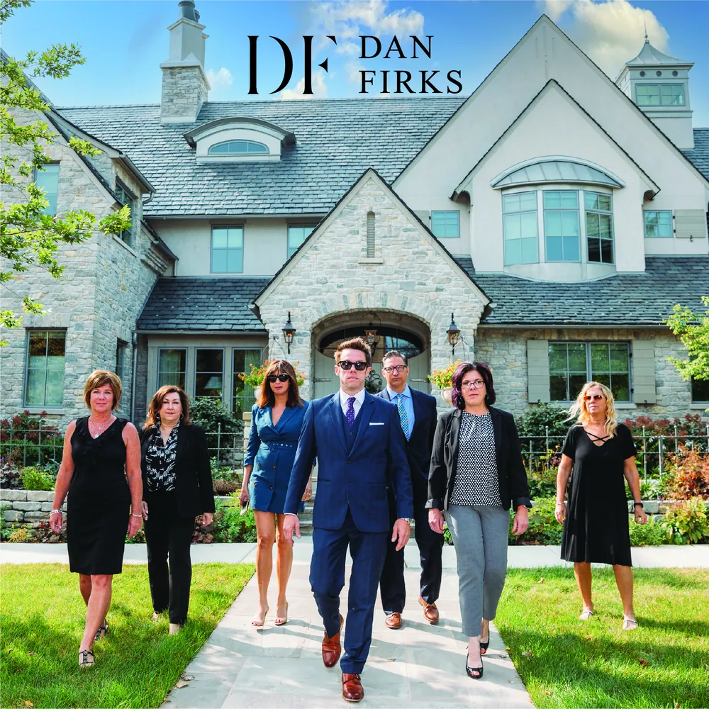 The Dan Firks real estate team in Naperville, Illinois The Dan Firks real estate team outside a Naperville, Illinois home